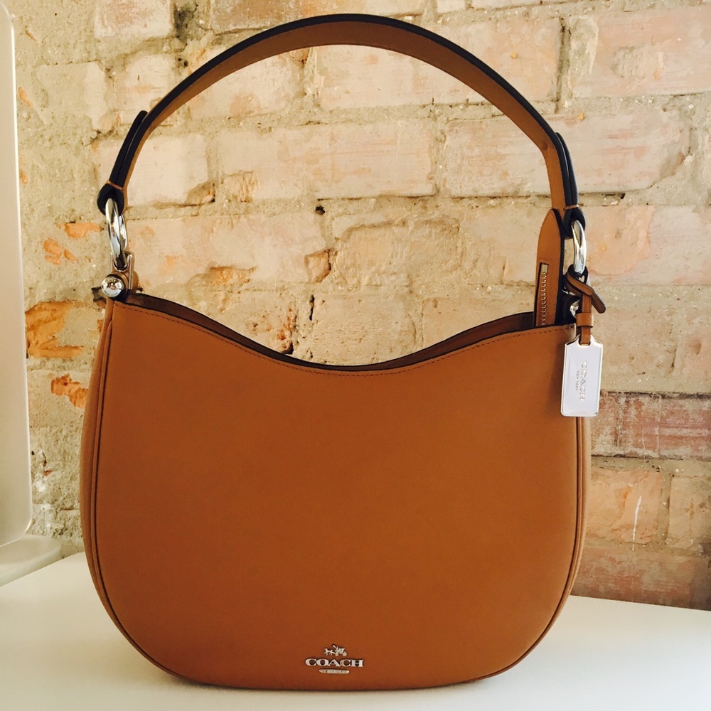 COACH Nomad Hobo in Light Saddle + Leather Cleaner